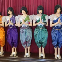 Ladies of the Royal Palace wearing different colored costumes each day per week