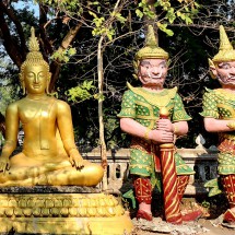 Buddha with two Guards close to Wat That Kuang