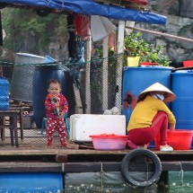 Little Boy with his Ma in the floating village of Cat Ba