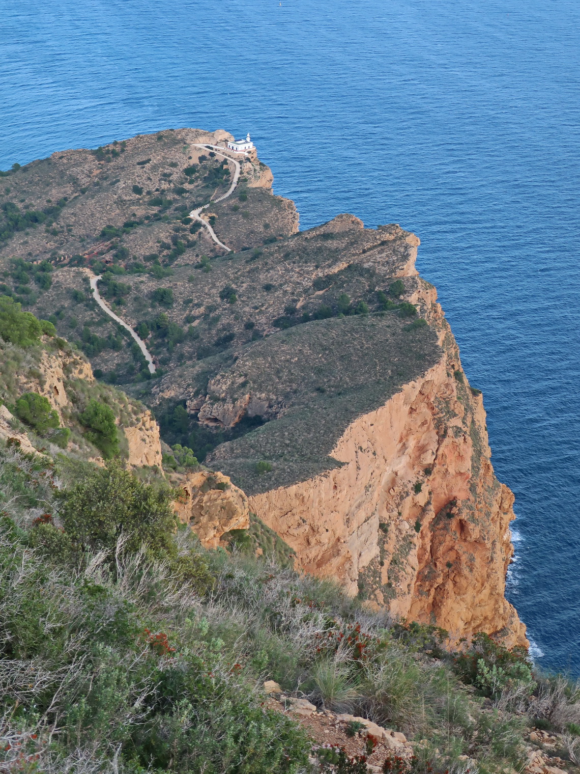 Lighthouse Far d'Albir seen from the descent