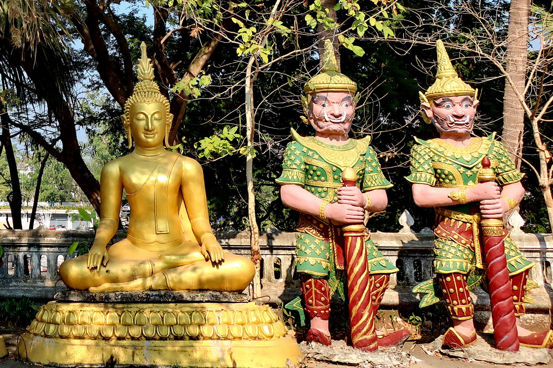 Buddha with two Guards close to Wat That Kuang