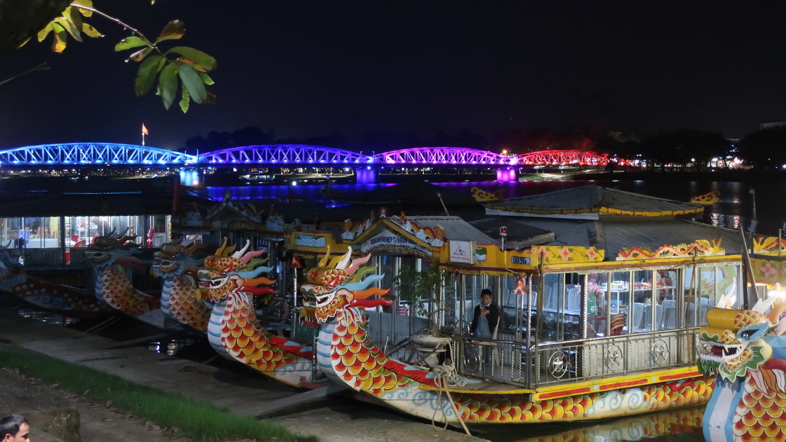 Boats on Perfume River with Truong Tien Bridge