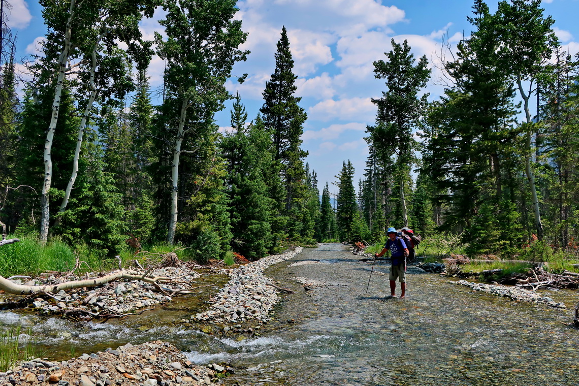 Alfred on the flooded street to the trailhead of Francs Peak