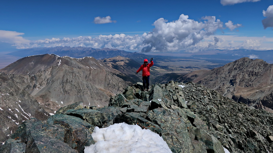 Marion is arriving on the summit of Blanca Peak