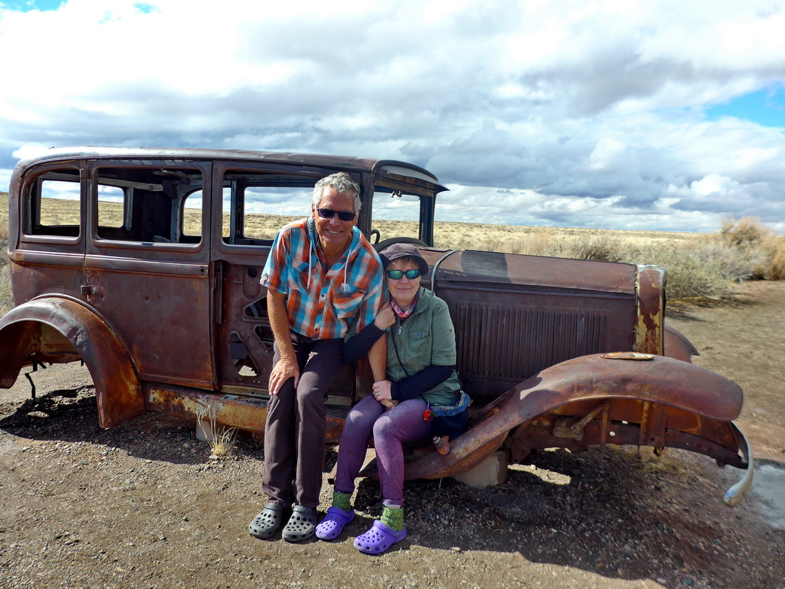 Car on Route 66, the highway of dreams, which leads through Petrified Forest