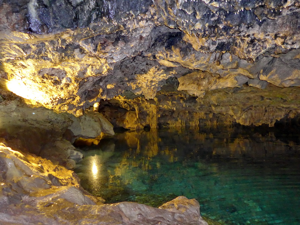 The illuminated entrance of Cenote Chihuan