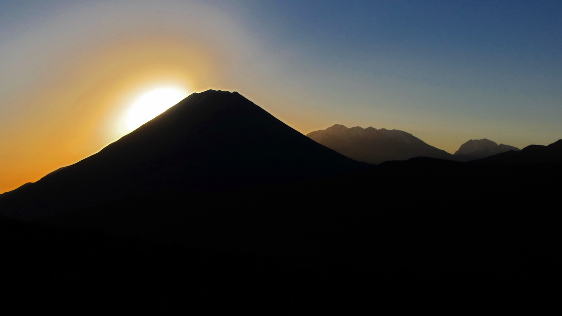 Volcan El Mists and Nevado Chachani at sunset, seen from the starting point to the northern summit of Nevado Pichu Pichu