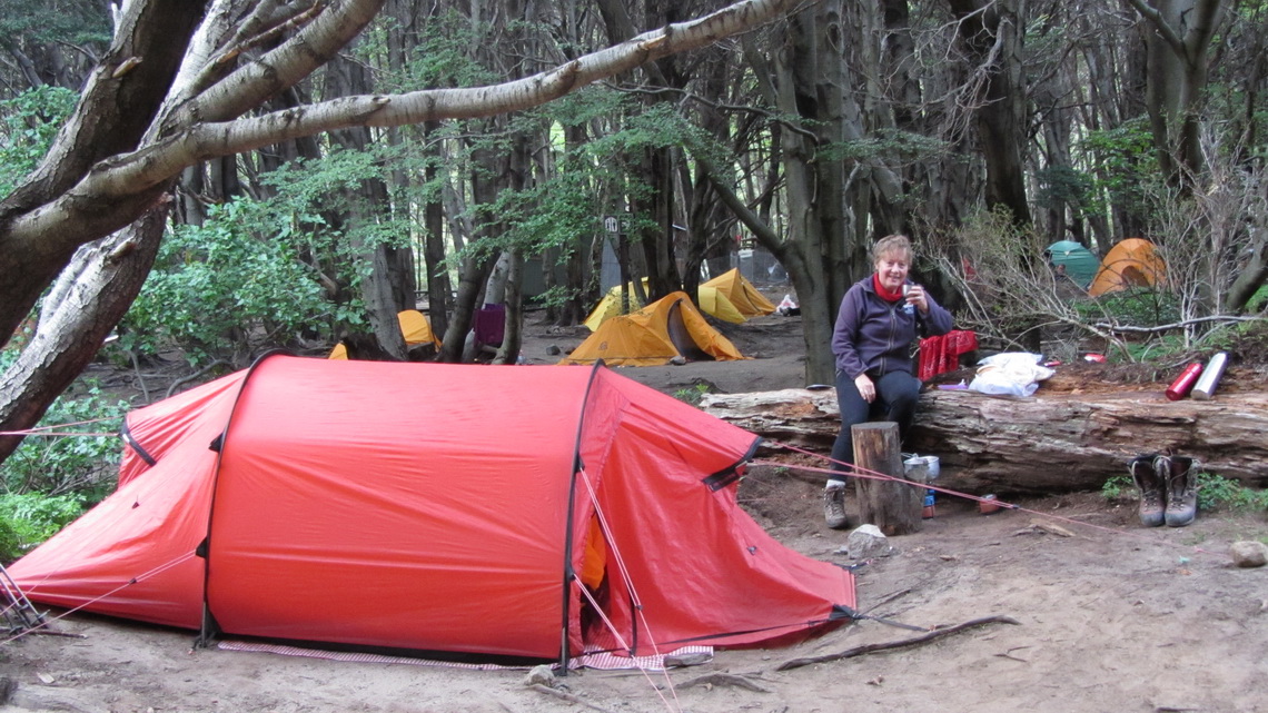 Our tent in the Campamento Italiano and Marion enjoying the red-wine