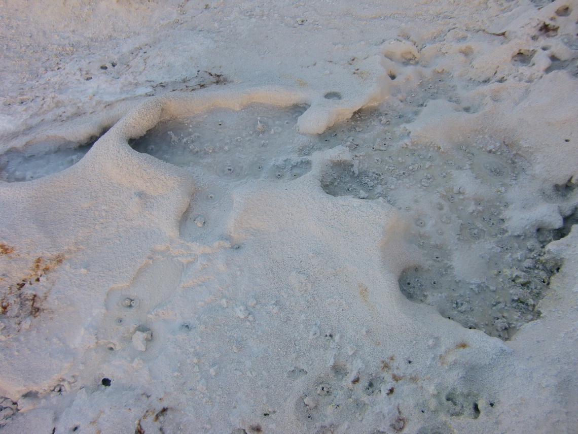 Bubbles in the saddle of the two summits