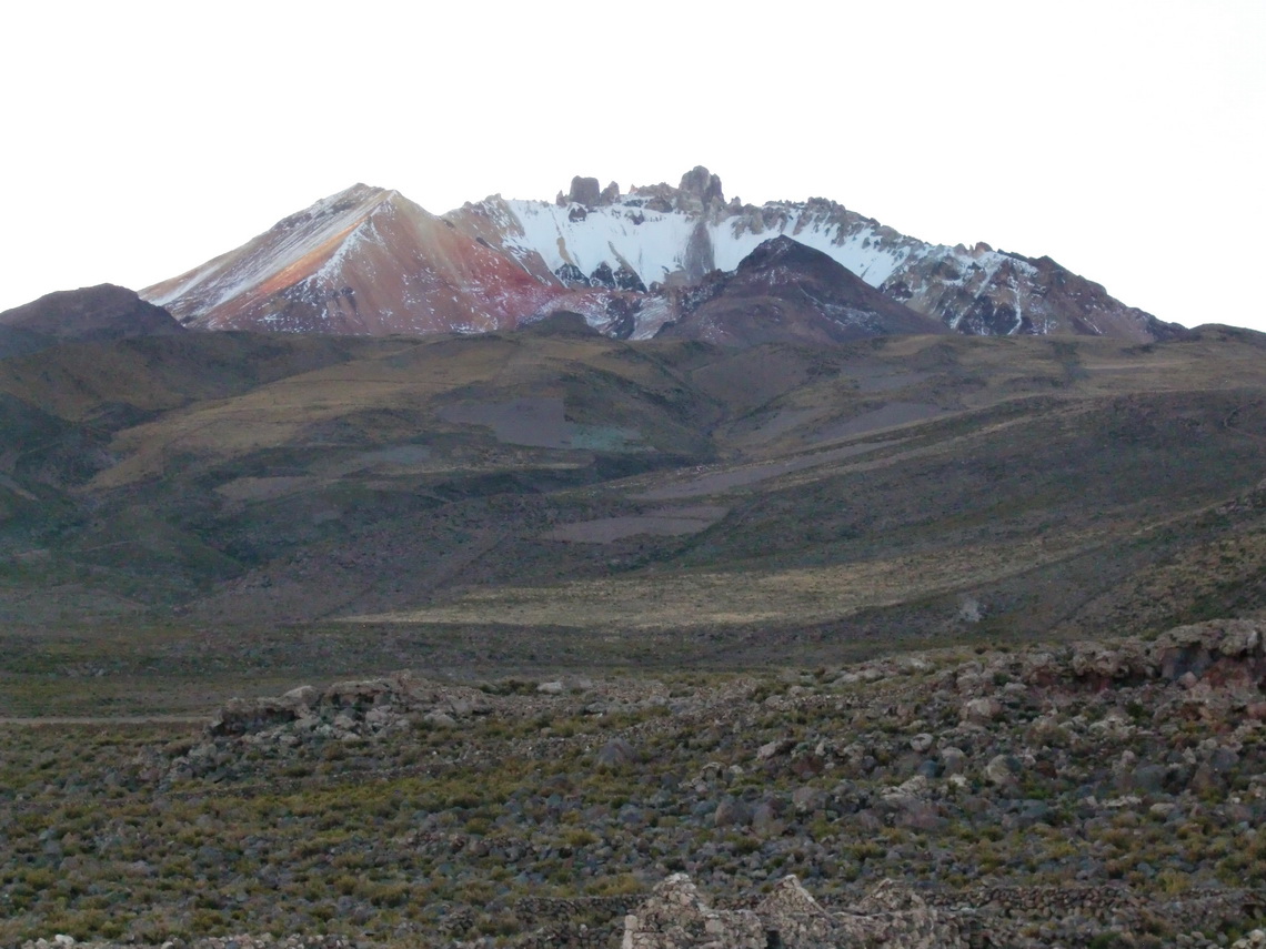 Volcano Tunupa in the last daylight - Accessible is the red brown colored peak on the left side