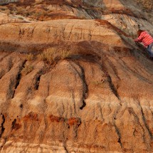 Rosemarie climbing up a muddy hill