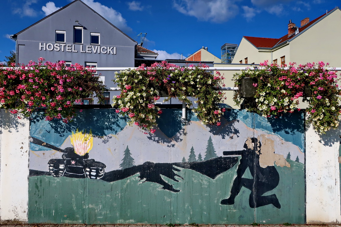 Mural on the waterfront promenade of Slovanski Brod depicting the Croatian War of Independence (1991 - 1995)