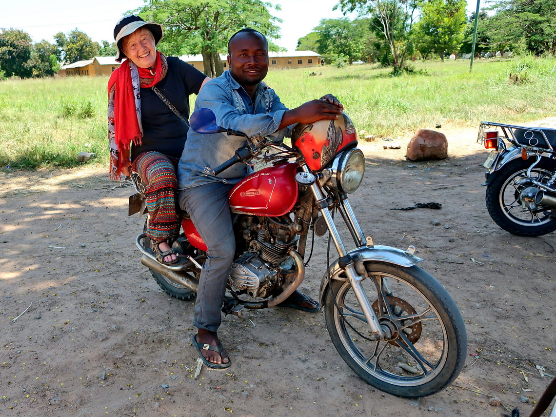 Granny on a hot bike on the way to Livingstone Tembe